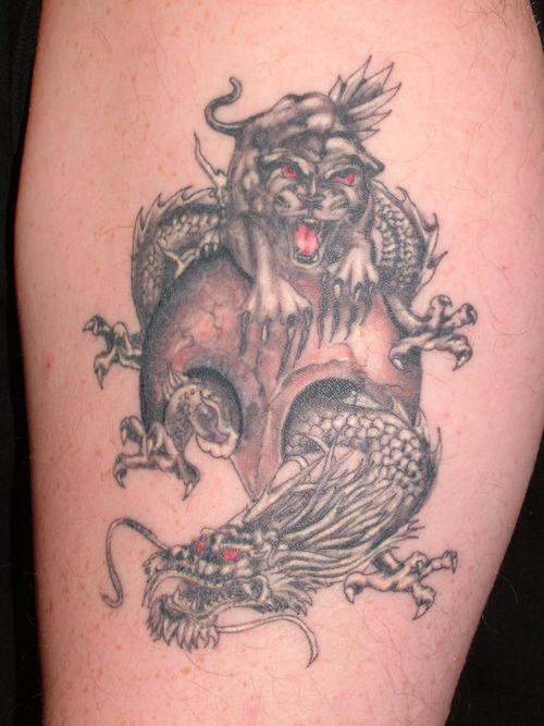 Dragon on Panther Tattoo Design