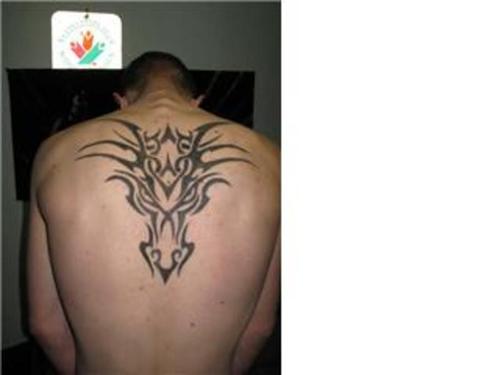 dragon head tattoos. Tribal Dragon Head