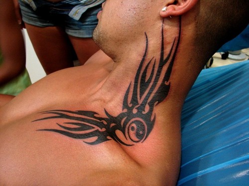 ying and yang tattoos. Tribal Yin Yang Tattoo