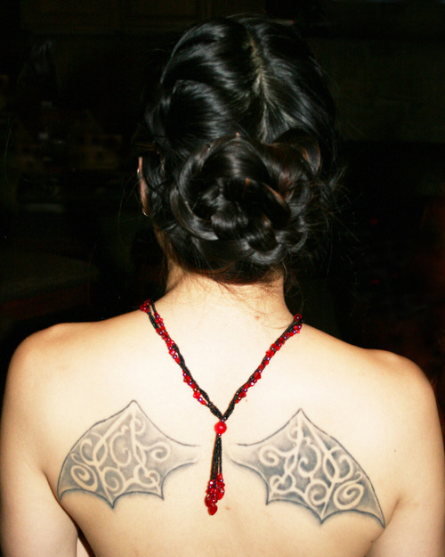 lower back tattoos wings. Lower Back Tattoo