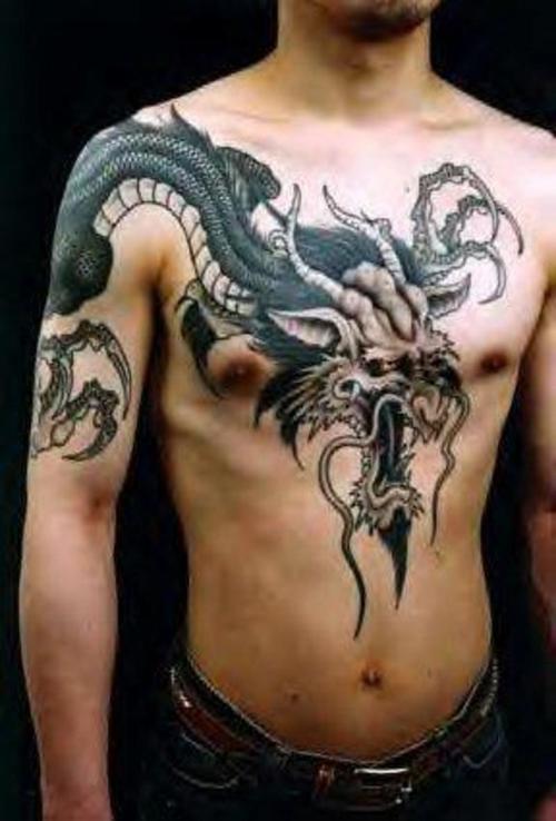 lettering tattoos on chest. Chest Dragon Tattoo